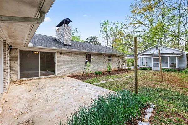 a house view with a garden space