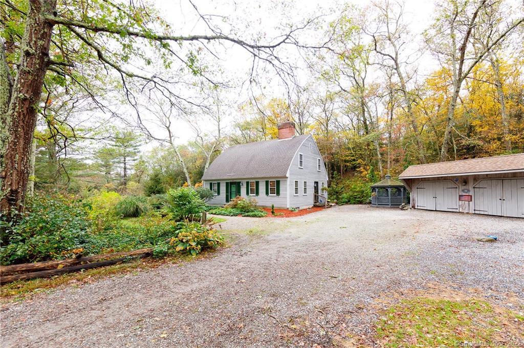 59 Pettingill Road Killingly, CT 06241 - Photo 1 of 1 front view of a house with a trees