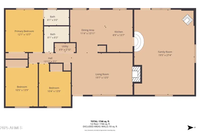 an aerial view of a house with a yard and lake view