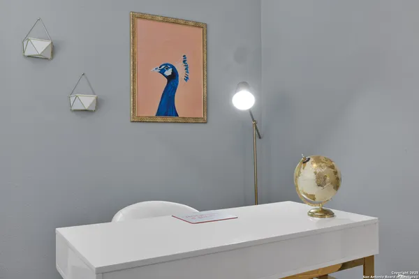 a bathroom with a sink a vanity and a mirror