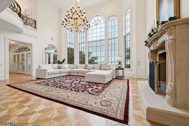 a living room with fireplace furniture and a flat screen tv