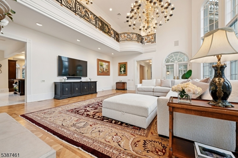 50 Laura Drive Cedar Grove, NJ 07009 - Photo 16 of 50 a living room with fireplace furniture and a flat screen tv