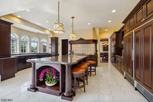 a dining room with furniture window and outside view