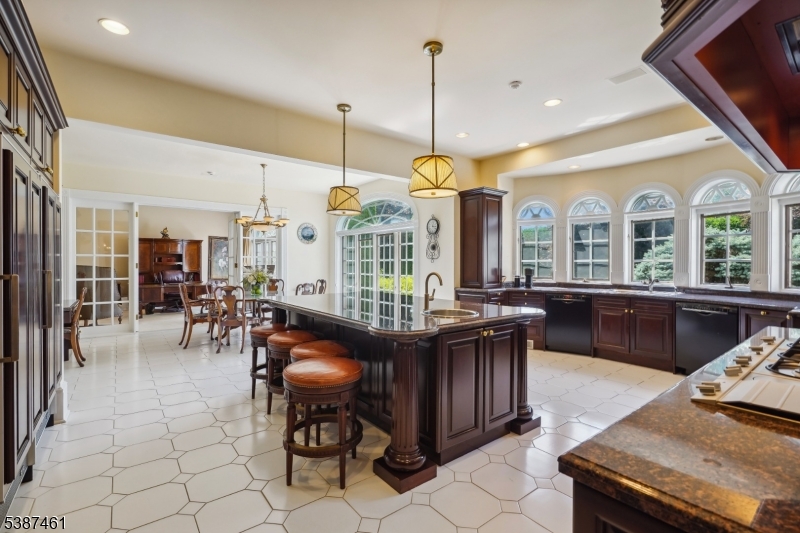 50 Laura Drive Cedar Grove, NJ 07009 - Photo 20 of 50 a view of a dining room with furniture window and wooden floor