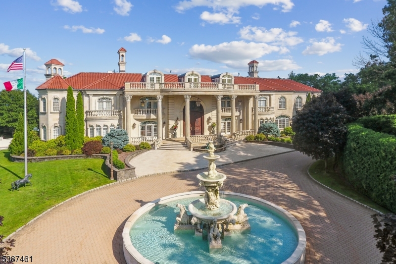 50 Laura Drive Cedar Grove, NJ 07009 - Photo 3 of 50 a front view of a house with garden