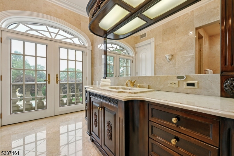50 Laura Drive Cedar Grove, NJ 07009 - Photo 33 of 50 a utility room with a stove and a large window