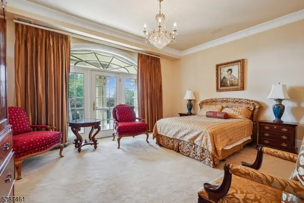 a bedroom with bed and a window