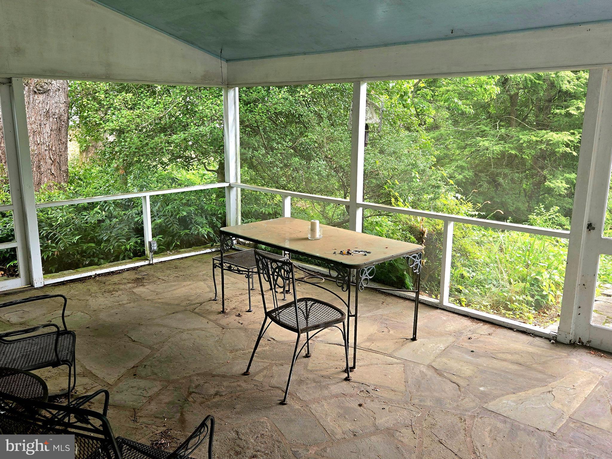 6750 Phillips Mill Road New Hope, PA 18938 - Photo 19 of 26 Back Flagstone Screened Porch