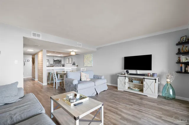 a dining room with furniture and outside view