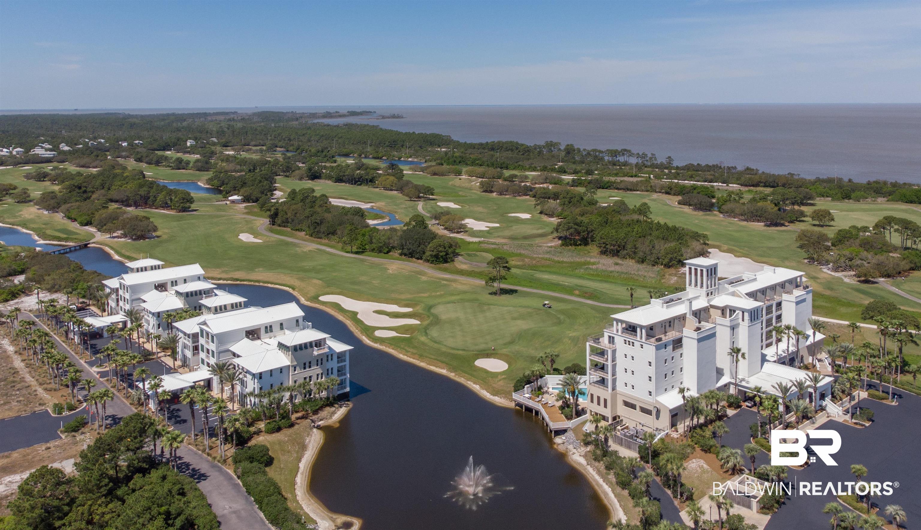 815 Plantation Road, Unit 405 Gulf Shores, AL 36542 - Photo 24 of 39 Drone / aerial view featuring a water view