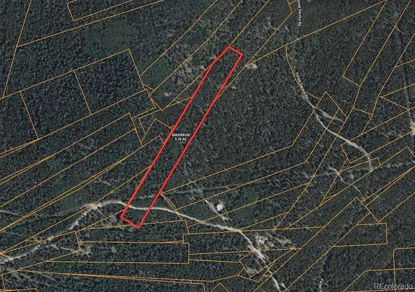 a view of an aerial view of residential houses with a lake and mountain view