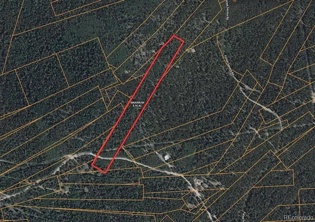 a view of an aerial view of residential houses with a lake and mountain view