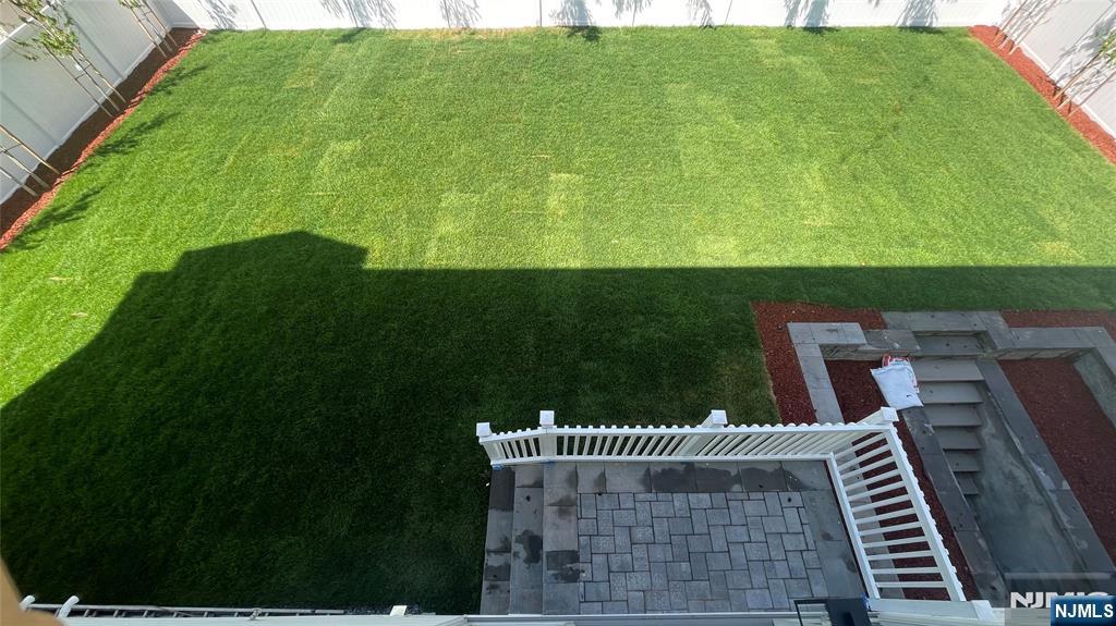 405 Valley Road River Edge, NJ 07661 - Photo 20 of 20 a view of an outdoor space and a yard