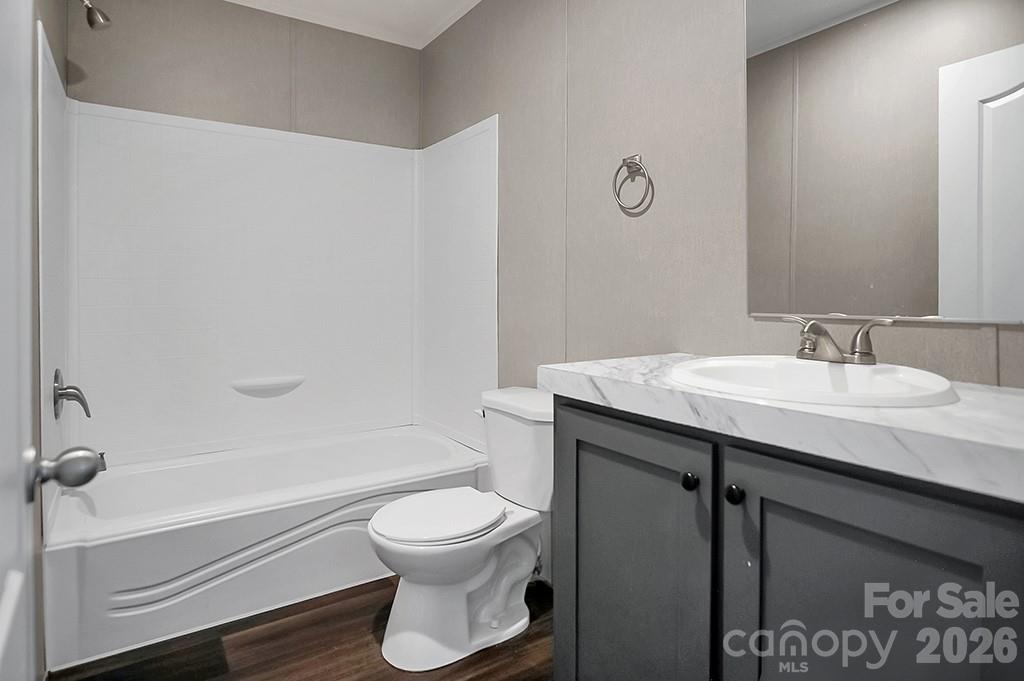 101 Park Lane Grover, NC 28073 - Photo 14 of 28 a bathroom with a sink toilet and shower