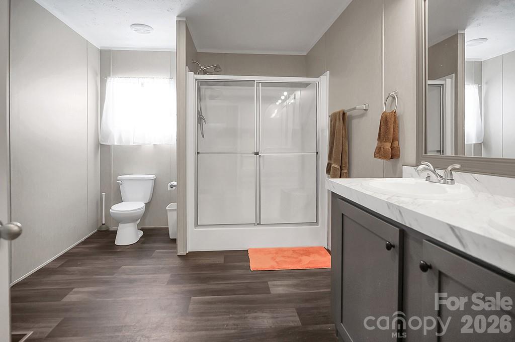 101 Park Lane Grover, NC 28073 - Photo 19 of 28 a spacious bathroom with a granite countertop sink and a mirror