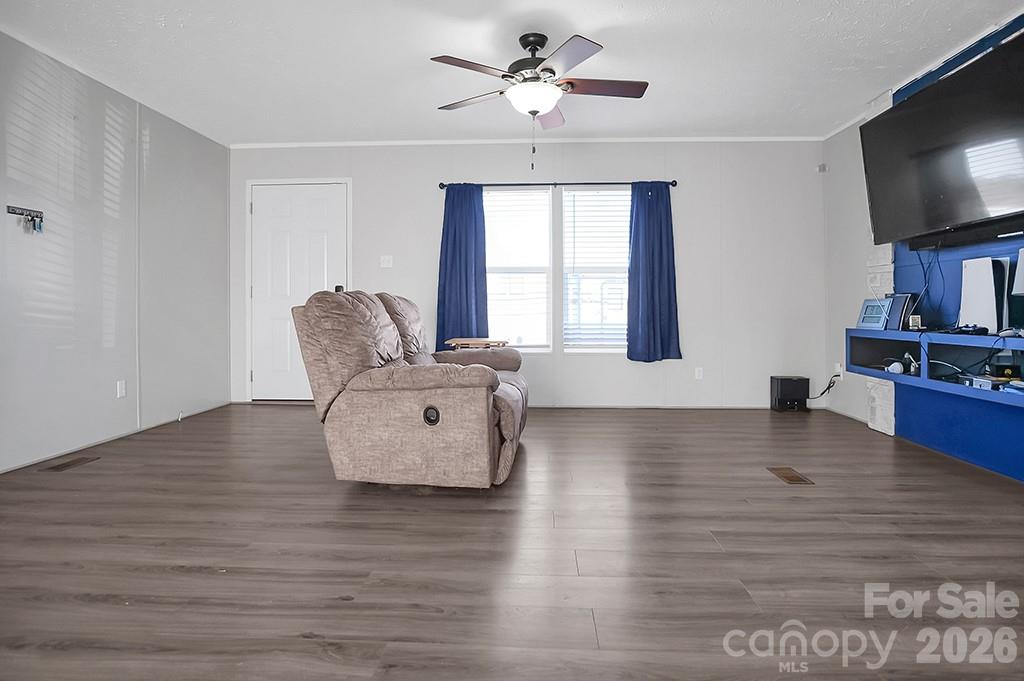 101 Park Lane Grover, NC 28073 - Photo 4 of 28 a living room with furniture wooden floor and a flat screen tv