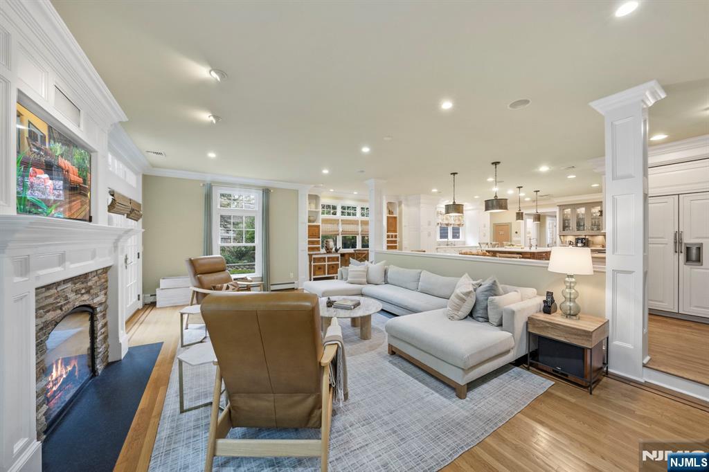203 Heights Road Ridgewood, NJ 07450 - Photo 22 of 41 a living room with fireplace furniture and a fireplace