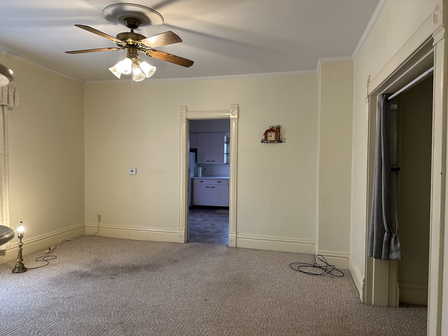 109 East Morris Street Morrison, IL 61270 - Photo 4 of 14 wooden floor in an empty room and a bathroom