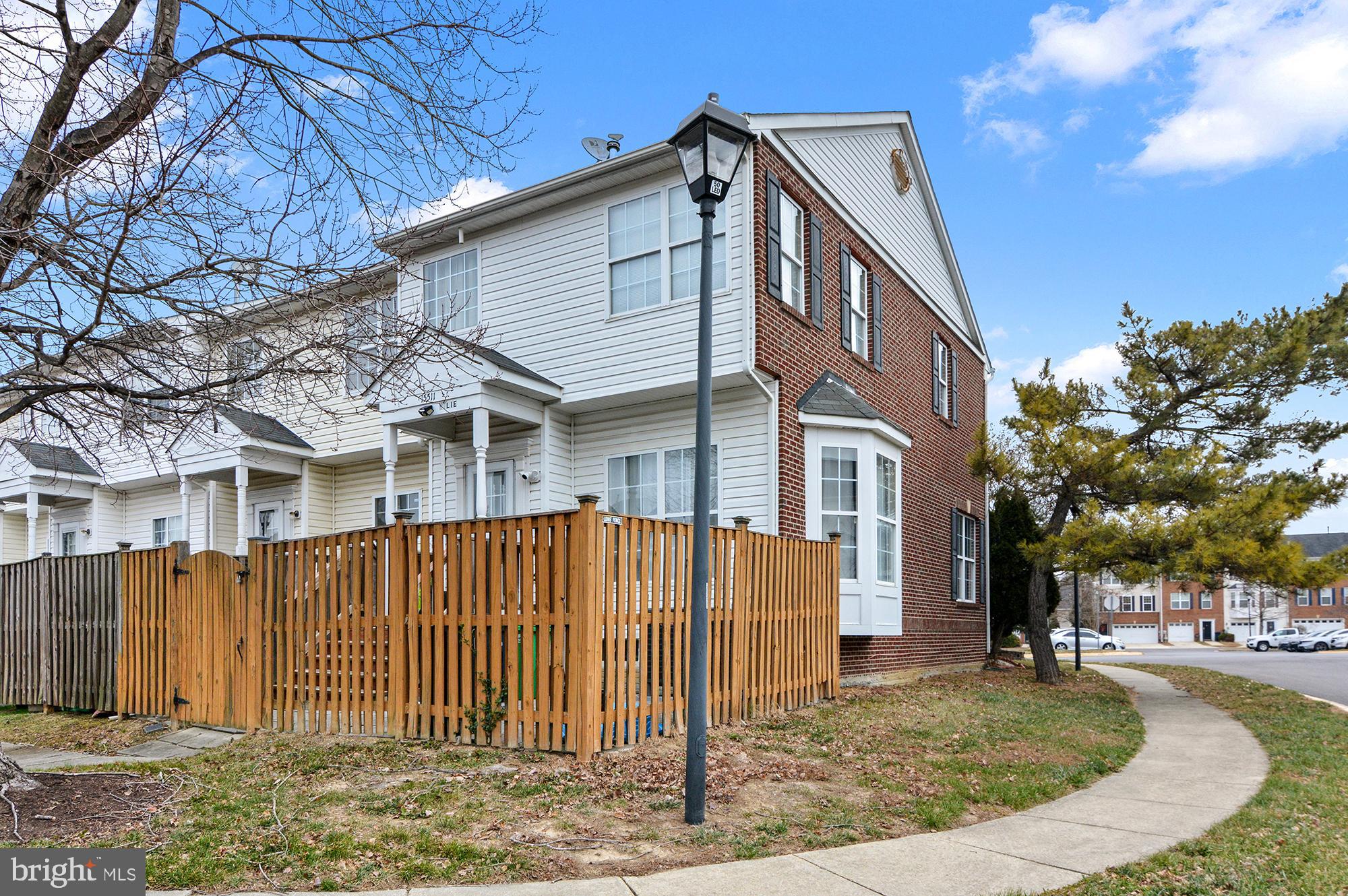 15511 Wylie Road Brandywine, MD 20613 - Photo 3 of 32 a front view of a house with a garden
