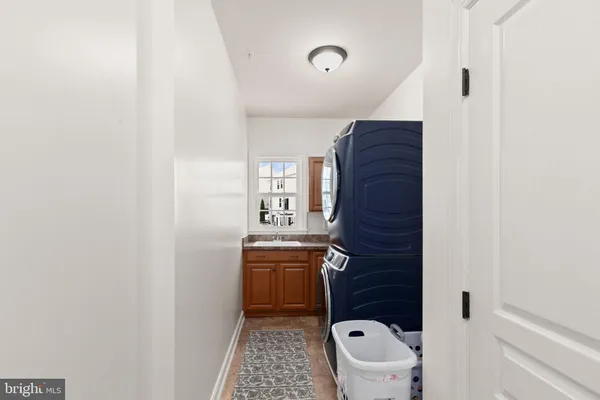 a bathroom with a toilet and a shower curtain