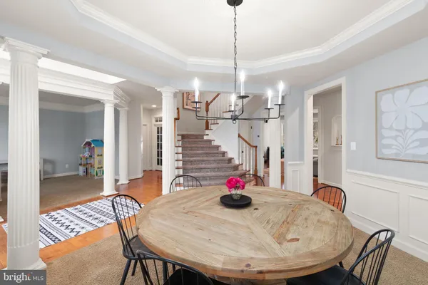 a view of a dining room with furniture