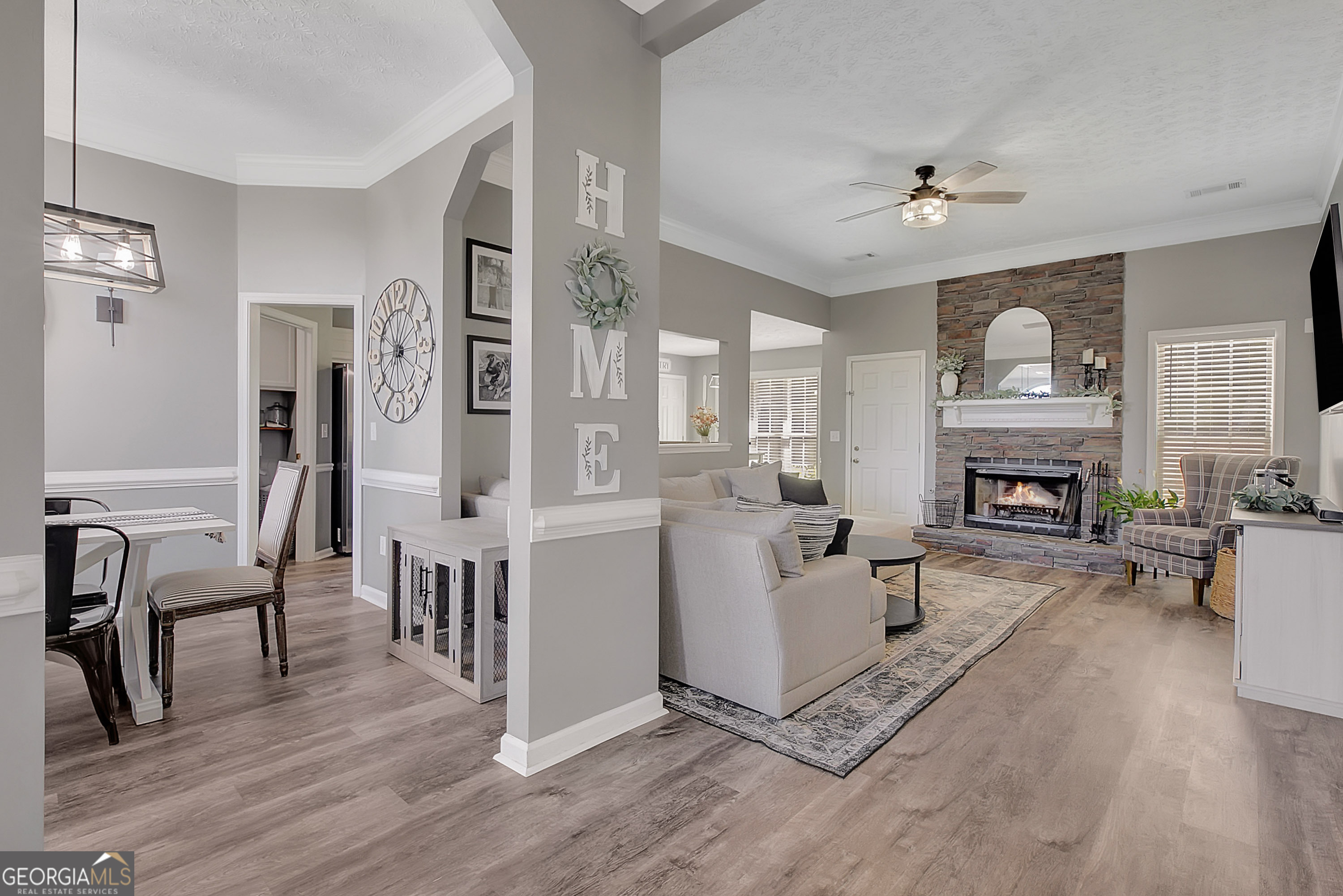 229 John Lovelace Road LaGrange, GA 30241 - Photo 6 of 59 a living room with furniture and a fireplace