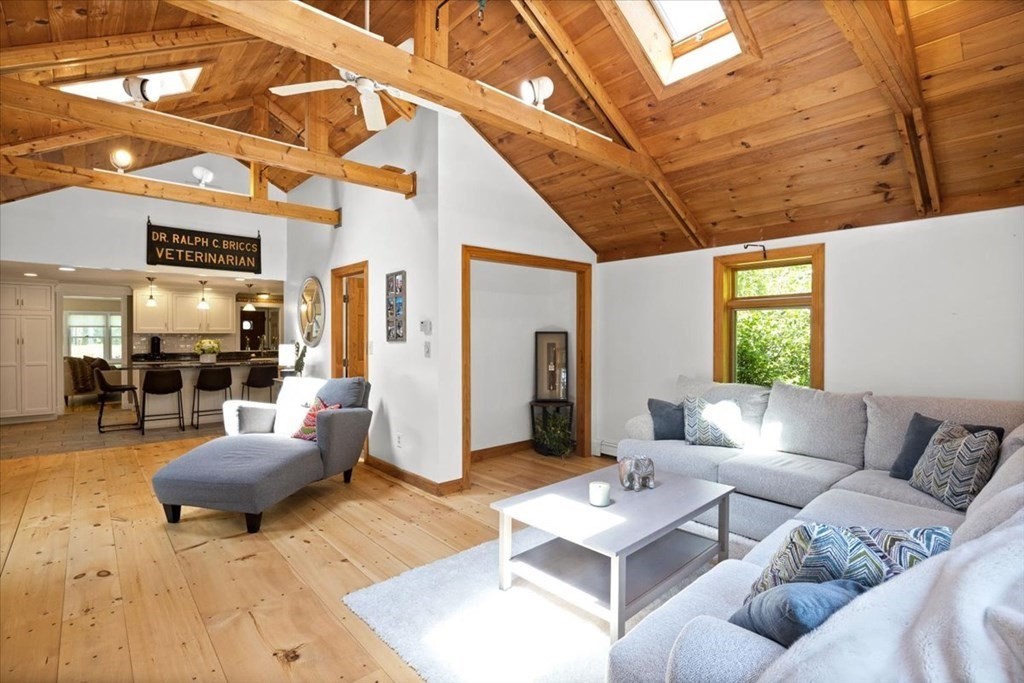 280 Broadway Hanover, MA 02339 - Photo 13 of 37 a living room with furniture and a rug