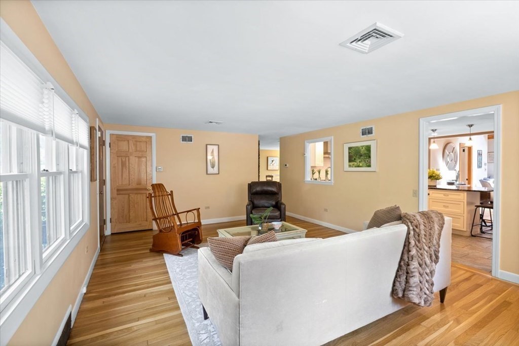 280 Broadway Hanover, MA 02339 - Photo 21 of 37 a living room with furniture and a table