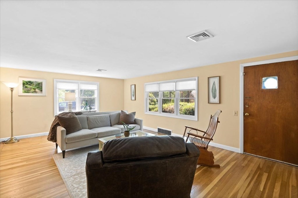 280 Broadway Hanover, MA 02339 - Photo 23 of 37 a living room with furniture and a table