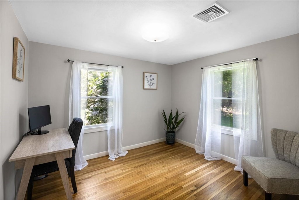 280 Broadway Hanover, MA 02339 - Photo 33 of 37 a view of a livingroom with furniture and a window