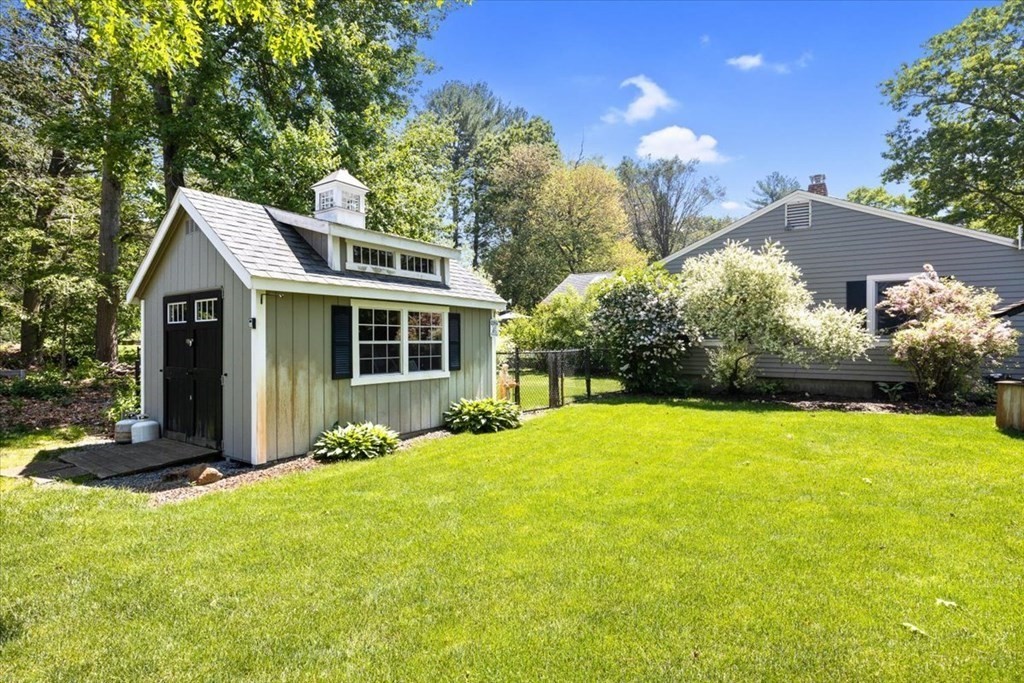 280 Broadway Hanover, MA 02339 - Photo 4 of 37 a front view of a house with a garden