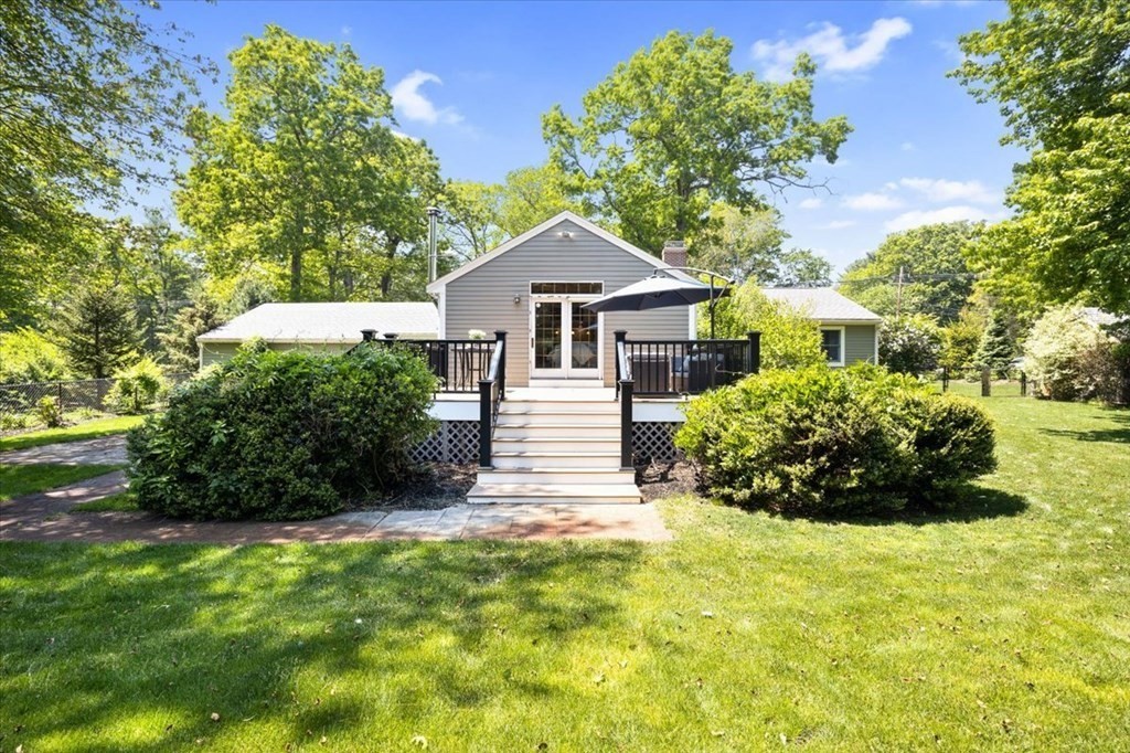 280 Broadway Hanover, MA 02339 - Photo 5 of 37 a view of a house with a yard and potted plants