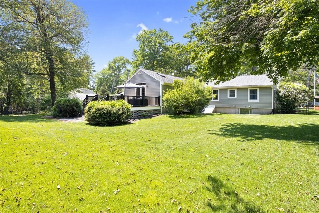 280 Broadway Hanover, MA 02339 - Photo 8 of 37 a house view with a garden space