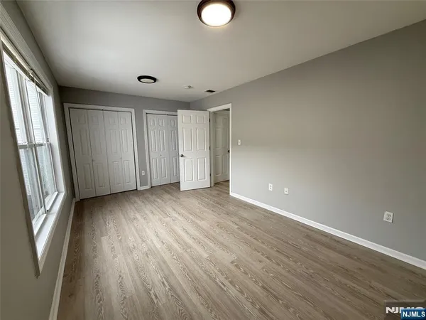 a bathroom with a sink toilet and mirror
