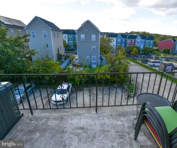 a view of a chairs and table in the terrace