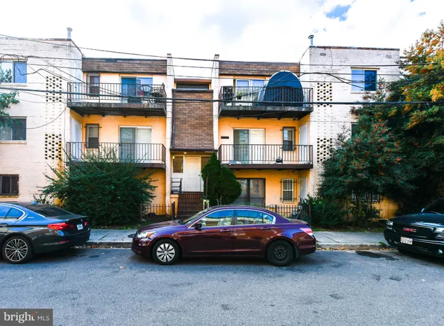 a car parked in front of a house