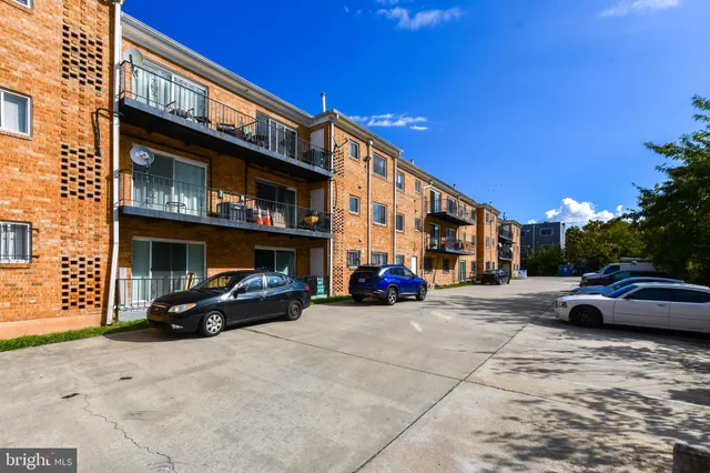 a view of house with yard and green space