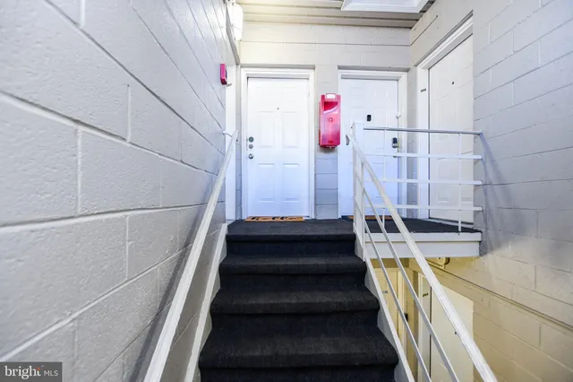 a view of entryway with a front door