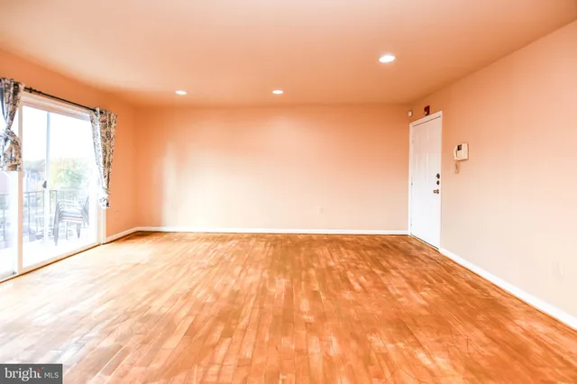 a view of an empty room and window