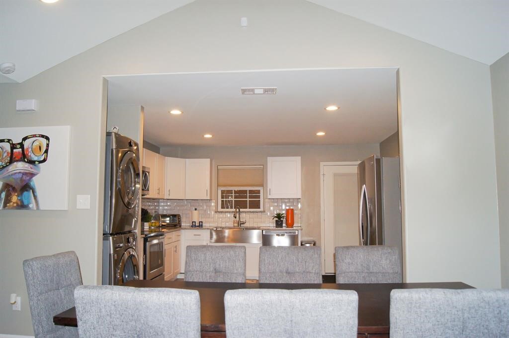 1727 Pueblo Street Dallas, TX 75212 - Photo 6 of 27 a living room with stainless steel appliances furniture and a view of kitchen