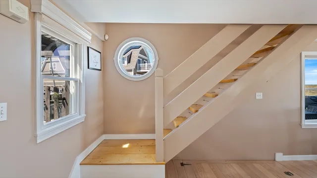 a view of a hallway with washer and dryer