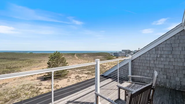 a view of sitting area with lake view