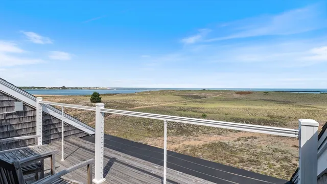 a view of an ocean with beach