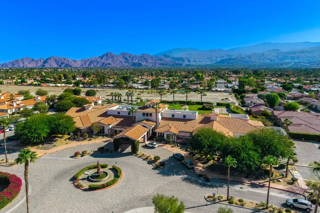 a view of a city with mountains