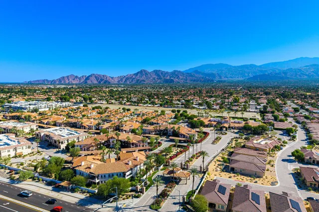 an aerial view of a city with lots of residential buildings