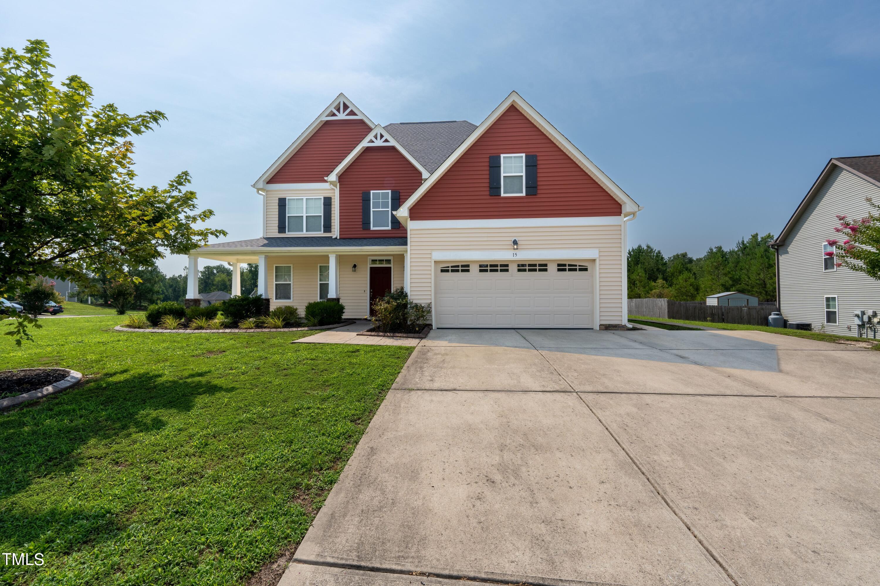 15 Lancaster Court Spring Lake, NC 28390 - Photo 1 of 48 a front view of a house with a yard