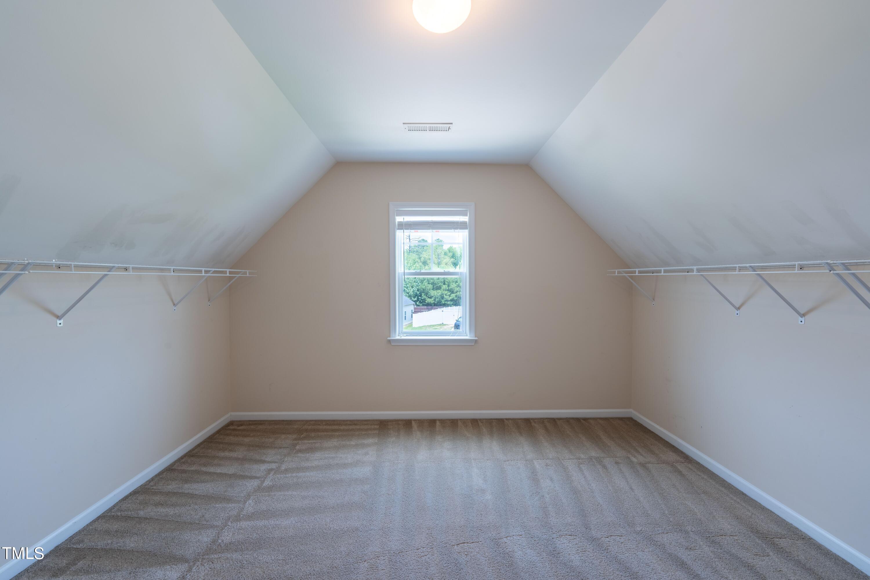15 Lancaster Court Spring Lake, NC 28390 - Photo 40 of 48 wooden floor in an empty room with a window