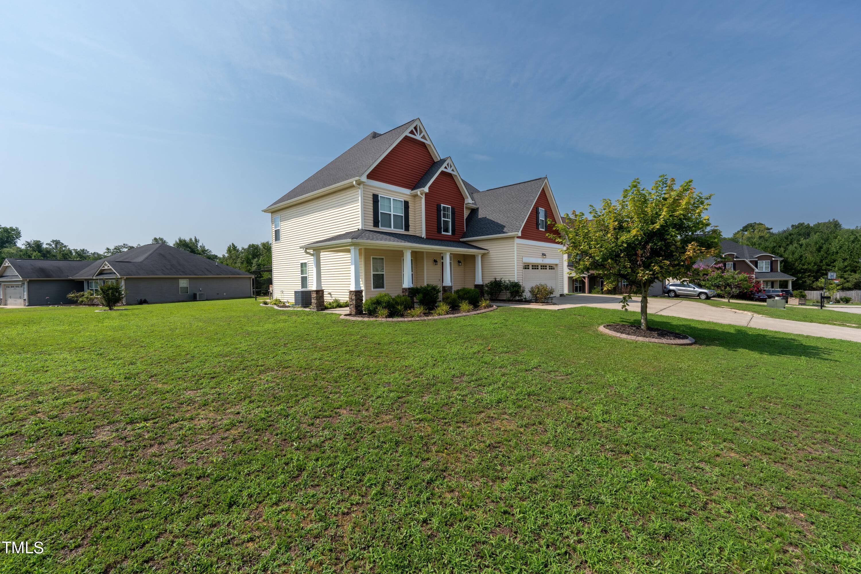 15 Lancaster Court Spring Lake, NC 28390 - Photo 4 of 48 a front view of house with yard and green space