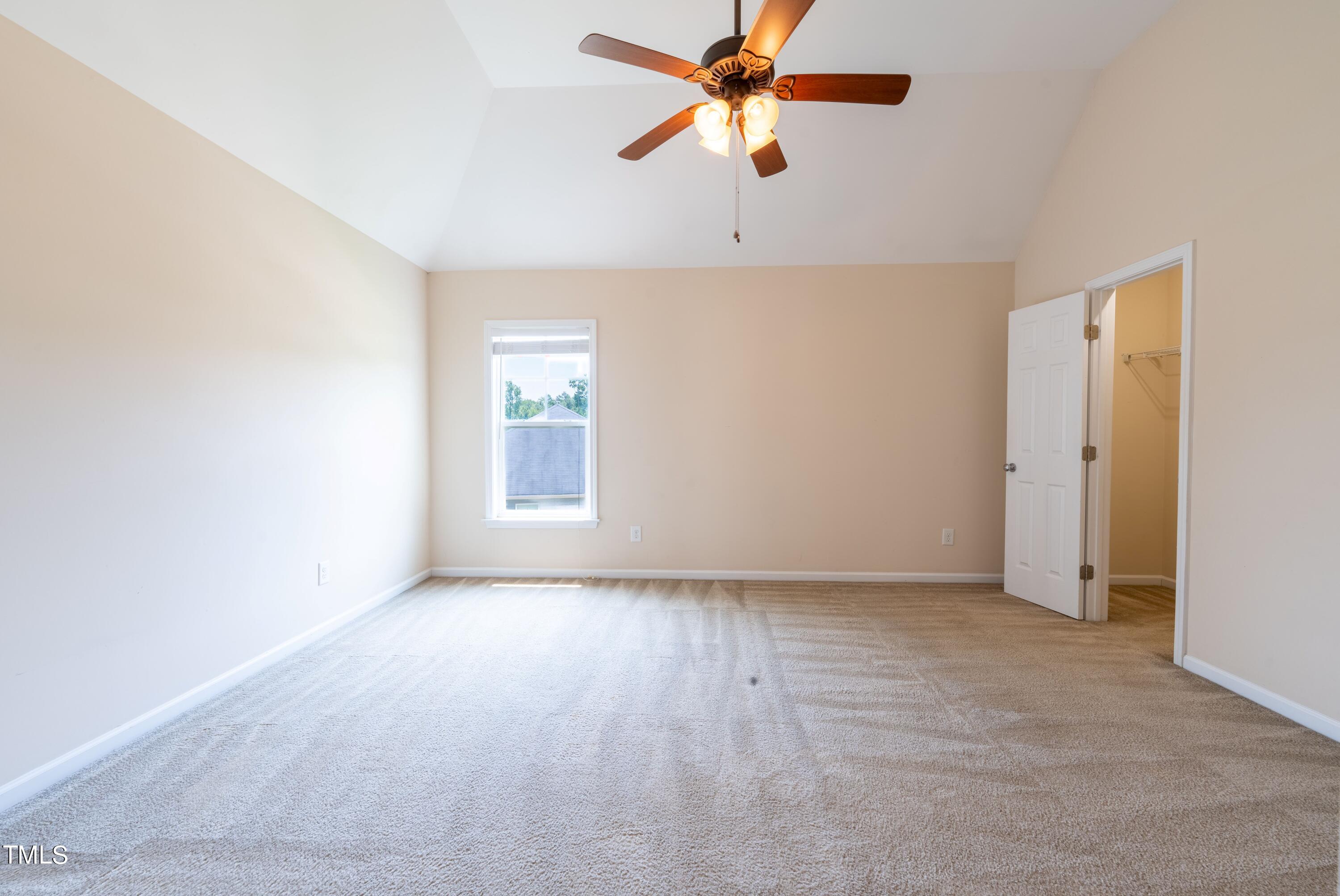 15 Lancaster Court Spring Lake, NC 28390 - Photo 43 of 48 an empty room with a window and a fan