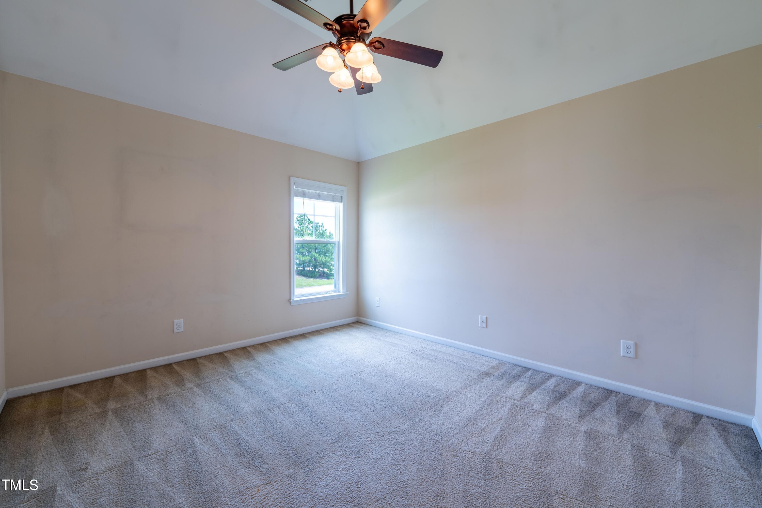 15 Lancaster Court Spring Lake, NC 28390 - Photo 45 of 48 an empty room with windows and fan
